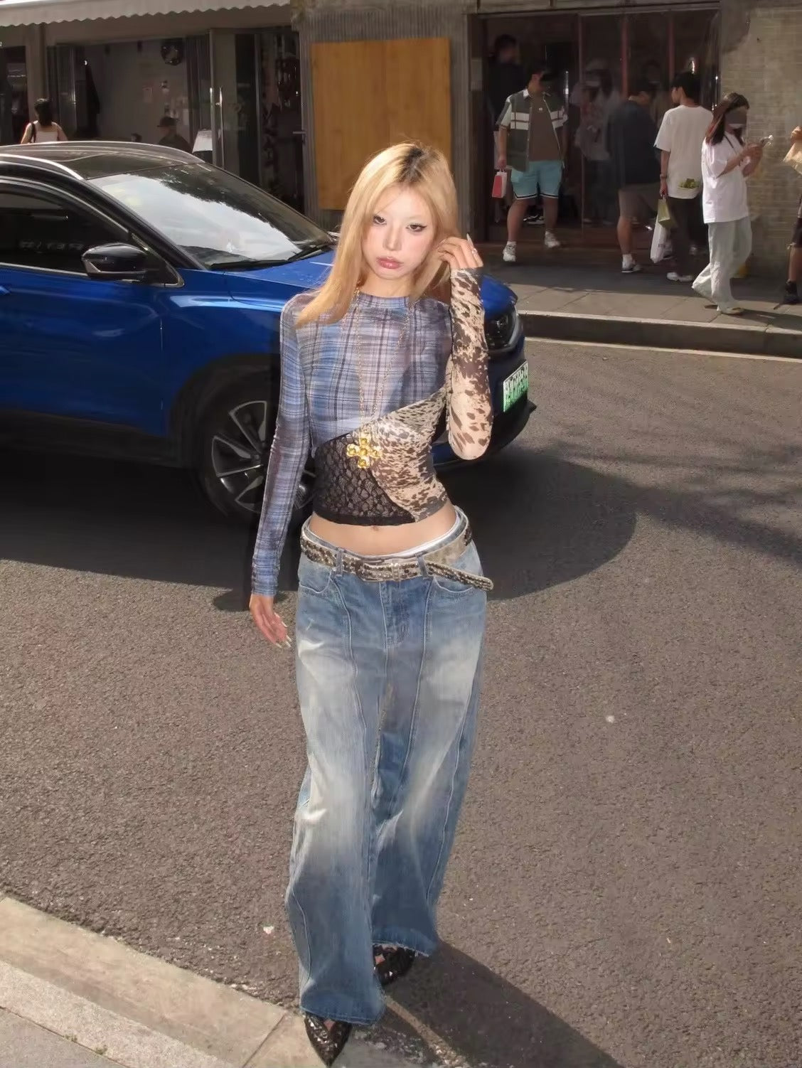 Model wearing retro mesh tee with vintage plaid print