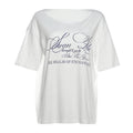 White off-shoulder graphic tee for Y2K streetwear lovers
