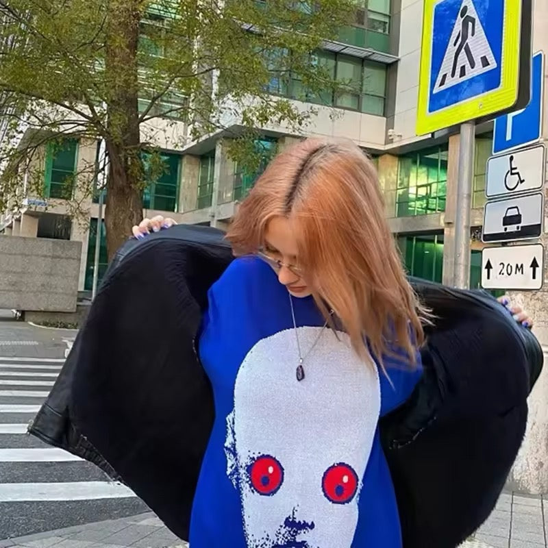 Aesthetic streetwear sweater with a creepy anime face design, perfect for edgy e-girl style
