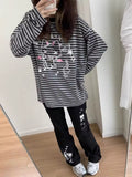 Harajuku inspired Hello Kitty shirt with striped sleeves