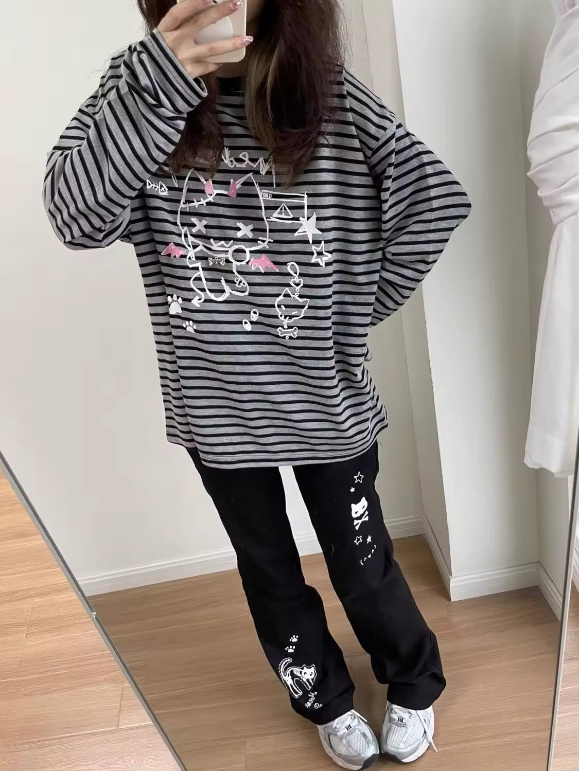 Harajuku inspired Hello Kitty shirt with striped sleeves