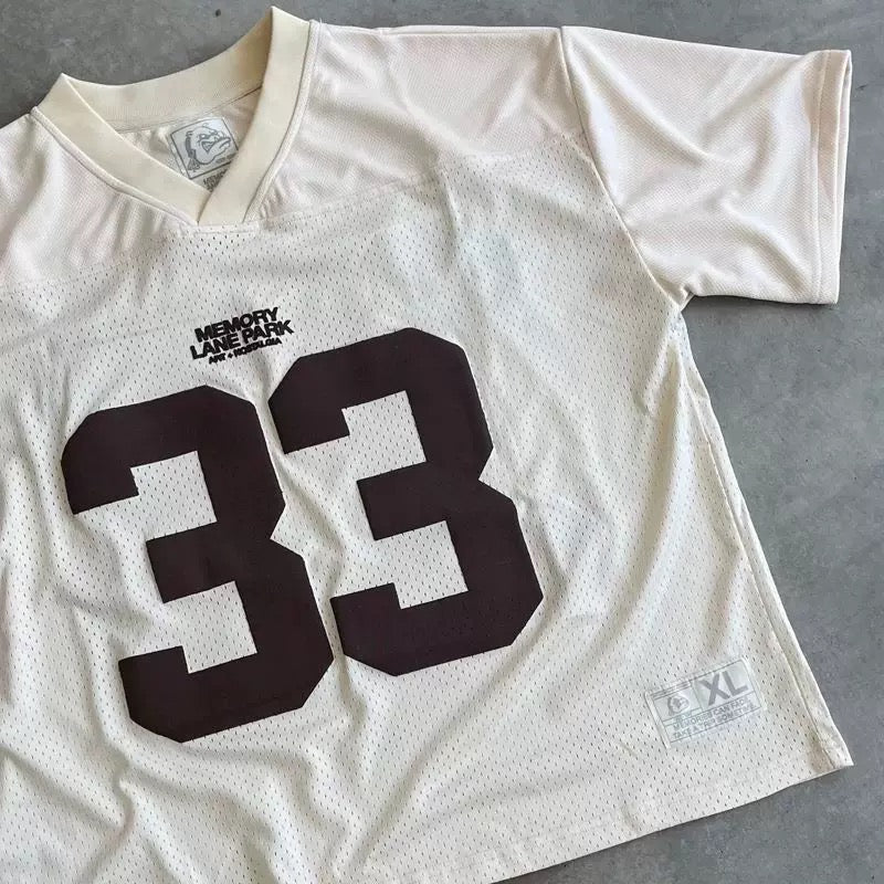Oversized football-style mesh tee with 33 print