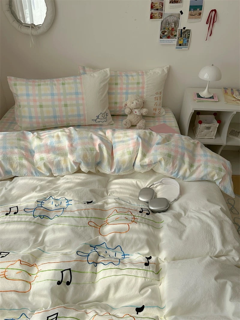 Bed with colorful bedding and pillows in a bedroom setting