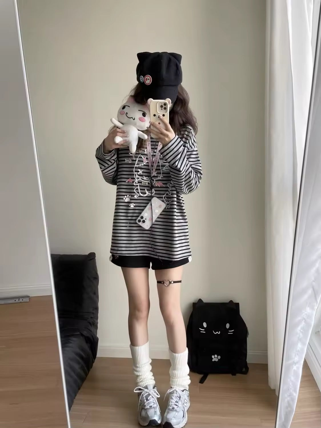 Black and white striped long sleeve top with cartoon
