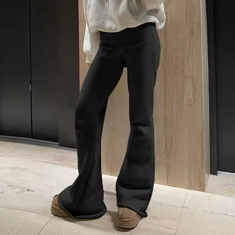 Slim-fit bootcut sweatpants for women, low-waisted Pilates Girl flare trousers, ideal for gym workouts, yoga, and streetwear-inspired Y2K fashion