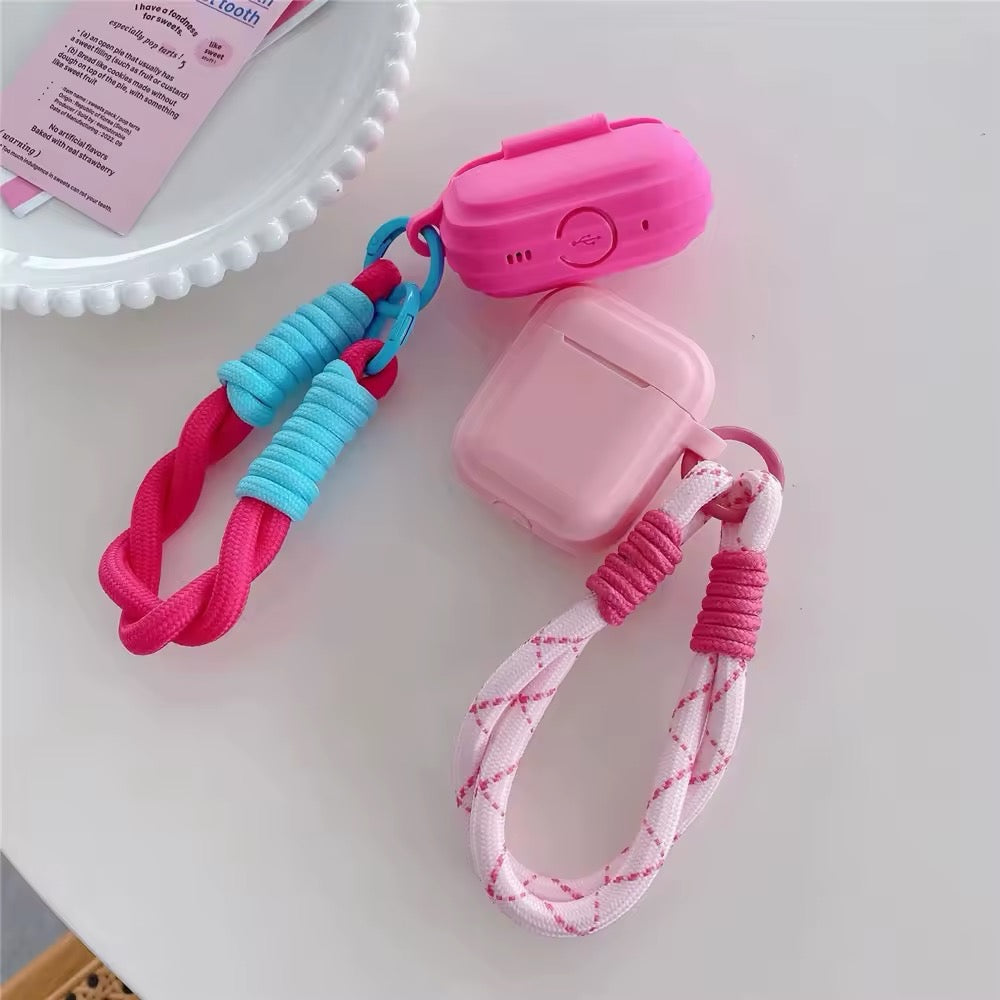 Pink wireless AirPods case with soft square shape and charm