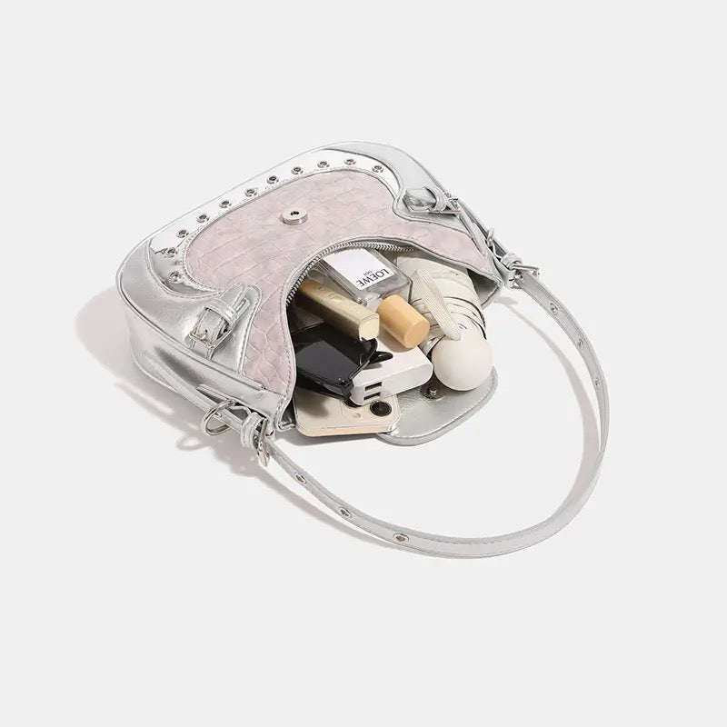 Soft girl and punk crescent shoulder bag in Y2K pink PU, inspired by moto biker and grunge fashion