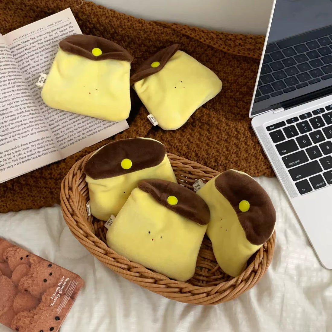 Front view of the Kawaii Caramel Pudding Earphone Bag showcasing its plush design and cute pudding motif
