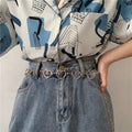Y2K metal waist belt with heart design on low-rise jeans