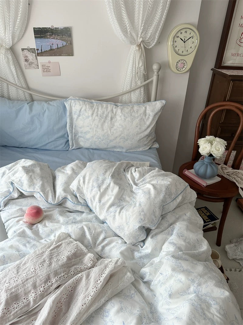 Bedroom with a bed, chair, and wall clock.