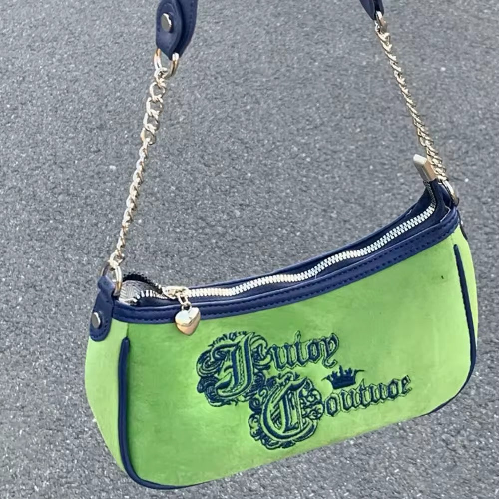Front view of the Retro Green Velvet Shoulder Bag showcasing heart-shaped embroidery