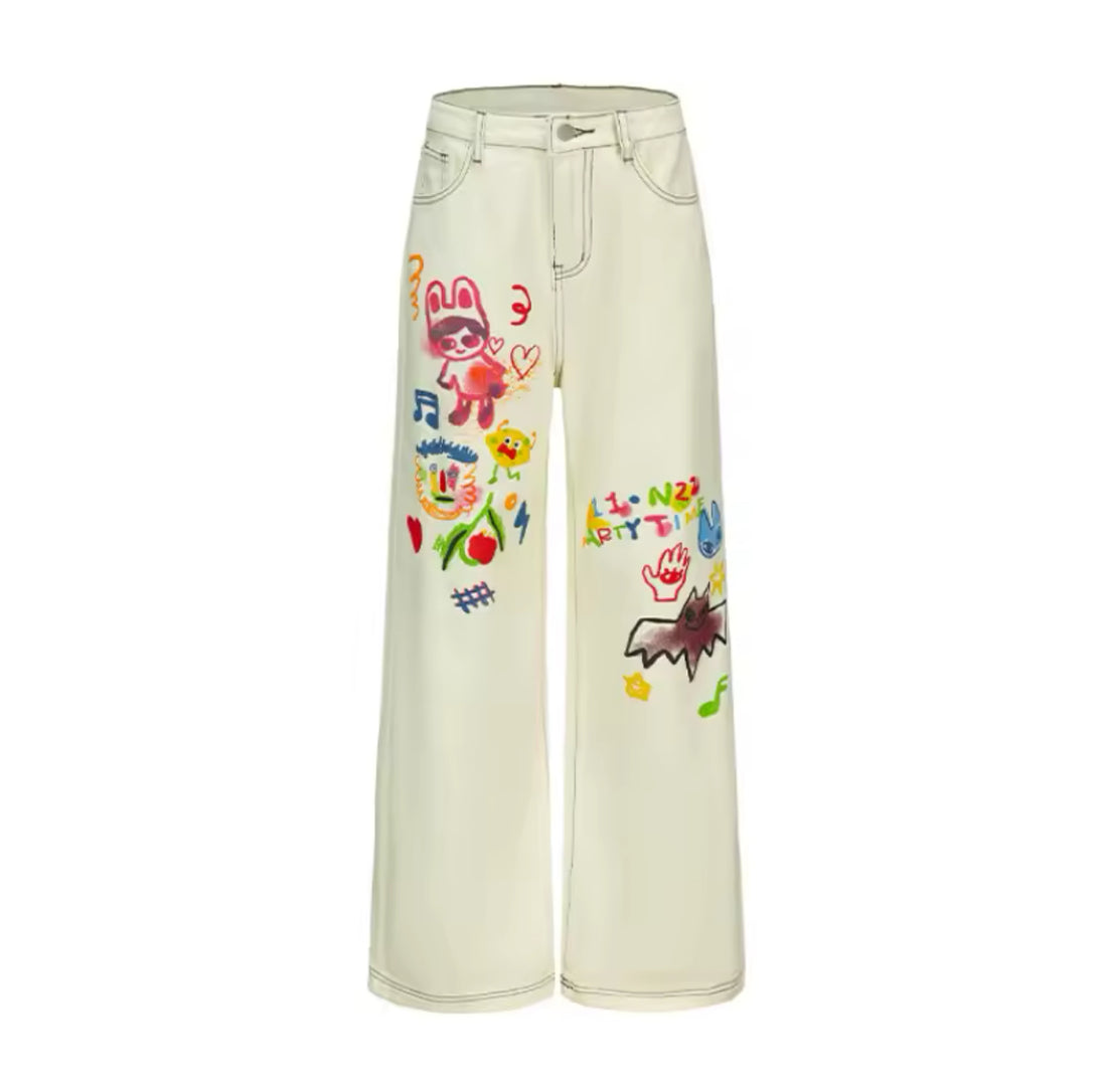 Colorful “PARTY TIME” print with playful hand-drawn elements on the leg of the pants