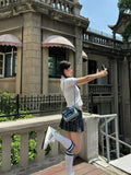 Y2K aesthetic pleated mini skirts for women with vintage check patterns