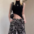 Y2K cyber grunge fashion tank top with a unique riveted patchwork design