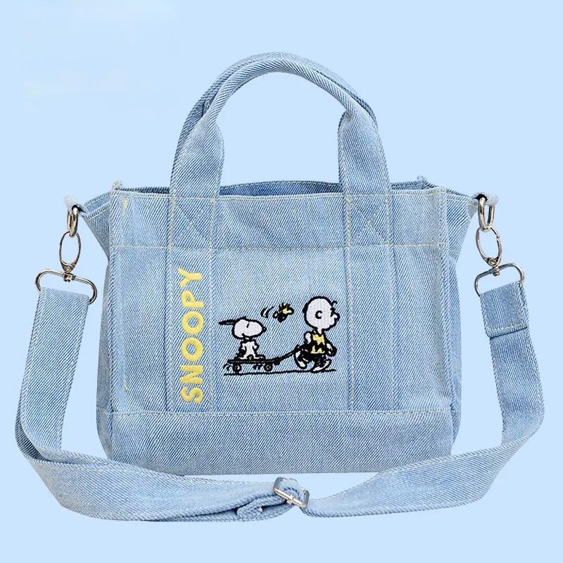 Snoopy cartoon fashion tote with soft pink details
