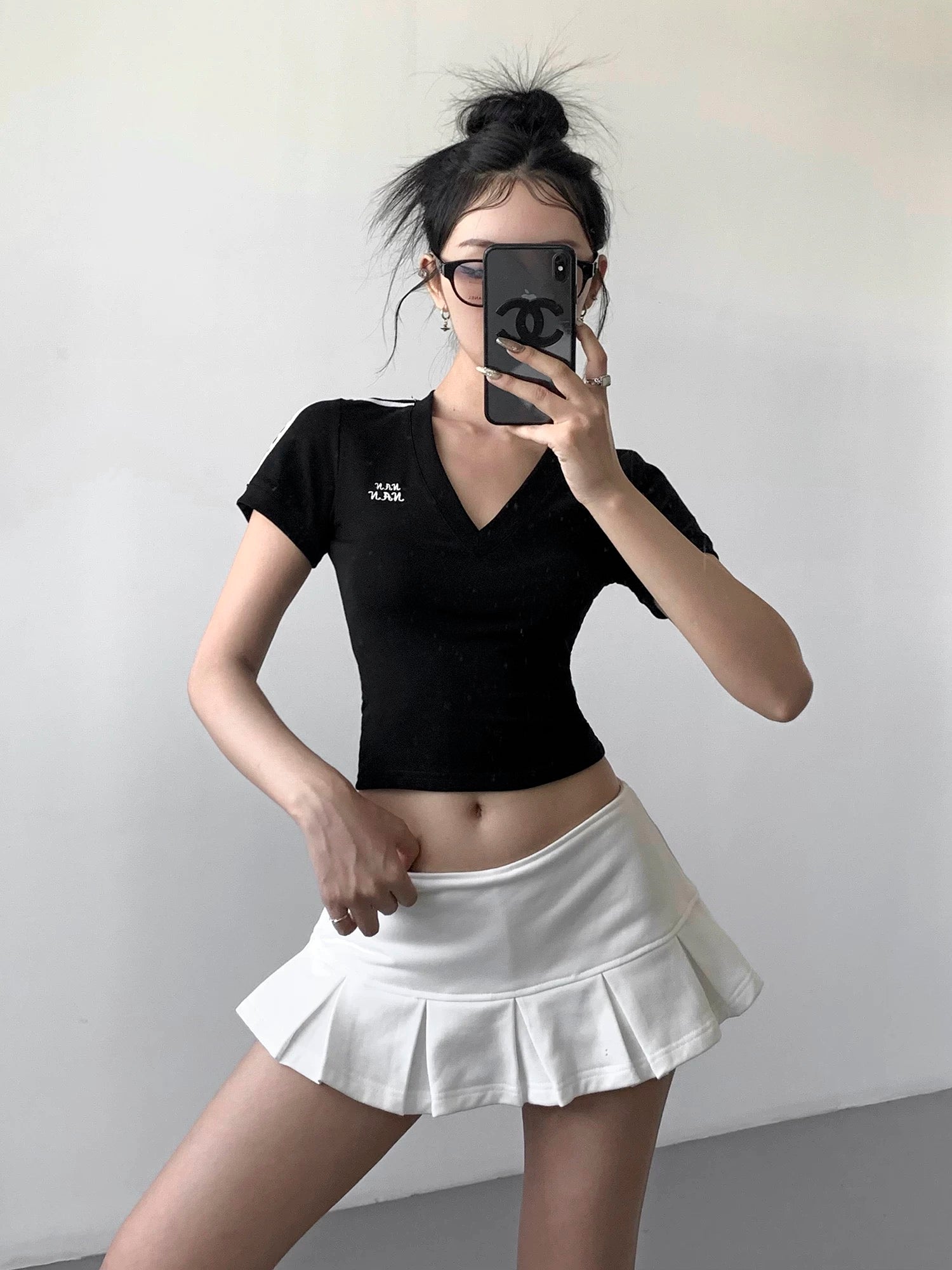 White aesthetic pleated skirt for minimalist looks