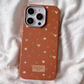 Aesthetic floral leather iPhone case with a vintage look
