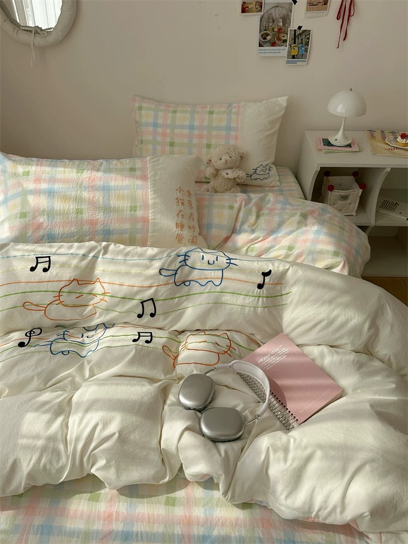 Bedding set with cartoon design on a bed in a room.