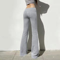Sporty streetwear flared joggers, Y2K low-waisted sweatpants for Pilates, casual workouts, yoga, and trendy athleisure fashion lovers