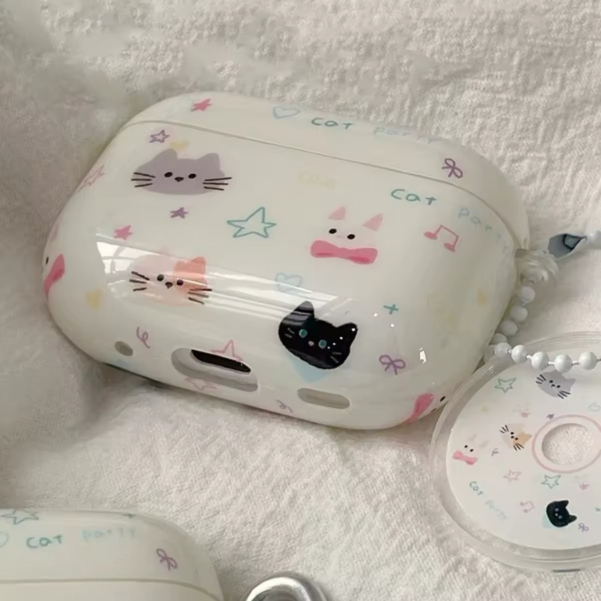 AirPods case with graffiti-style cat print