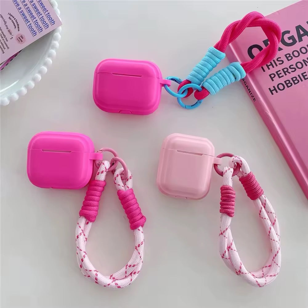 Pink wireless AirPods case with soft square shape and charm