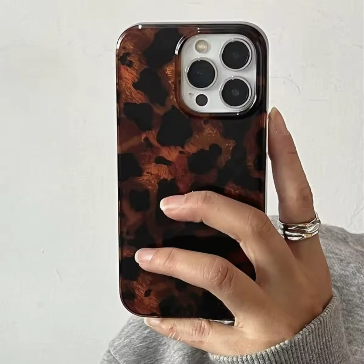 Shockproof silicone case featuring dark leopard vortex pattern