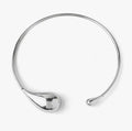 Bold metal jewelry piece for high-fashion streetwear