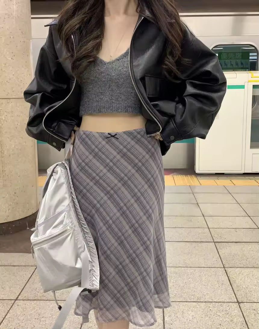 Soft girl plaid midi skirt close-up of pleats