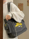 Women's shopper tote bag with side pockets and long straps