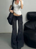 Back view displaying the flattering fit and pocket placement on the vintage-inspired jeans.