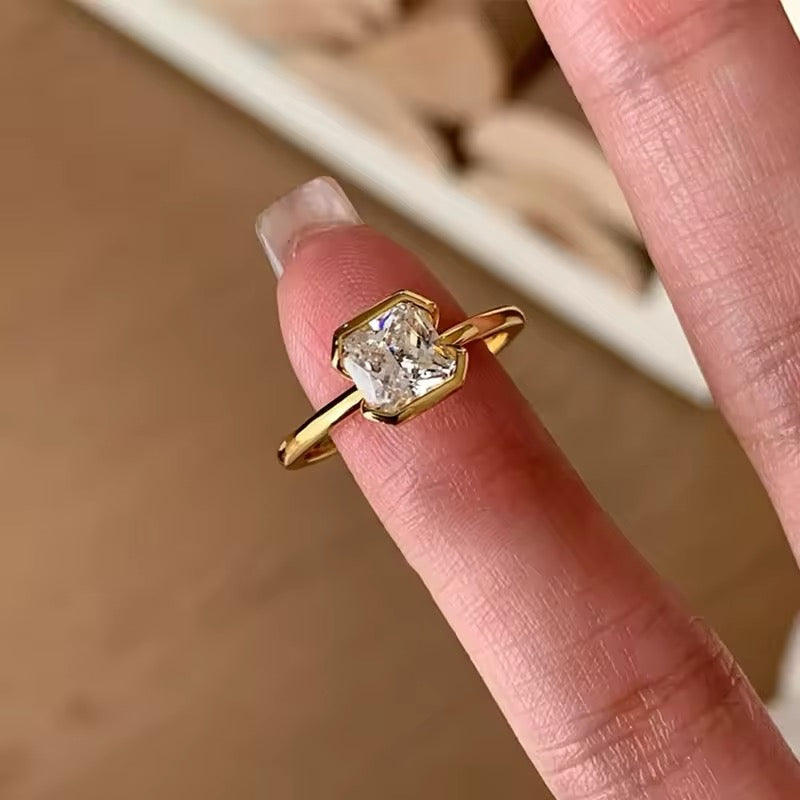 Sparkling teardrop ring close-up on jewelry stand