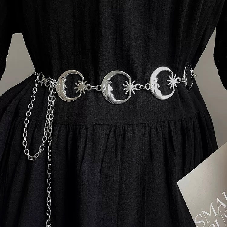 Witchcore outfit accessorized with moon waist chain and cosmic jewelry