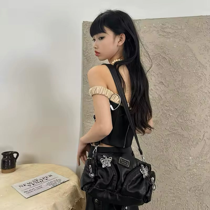 Side view of vintage Y2K black handbag