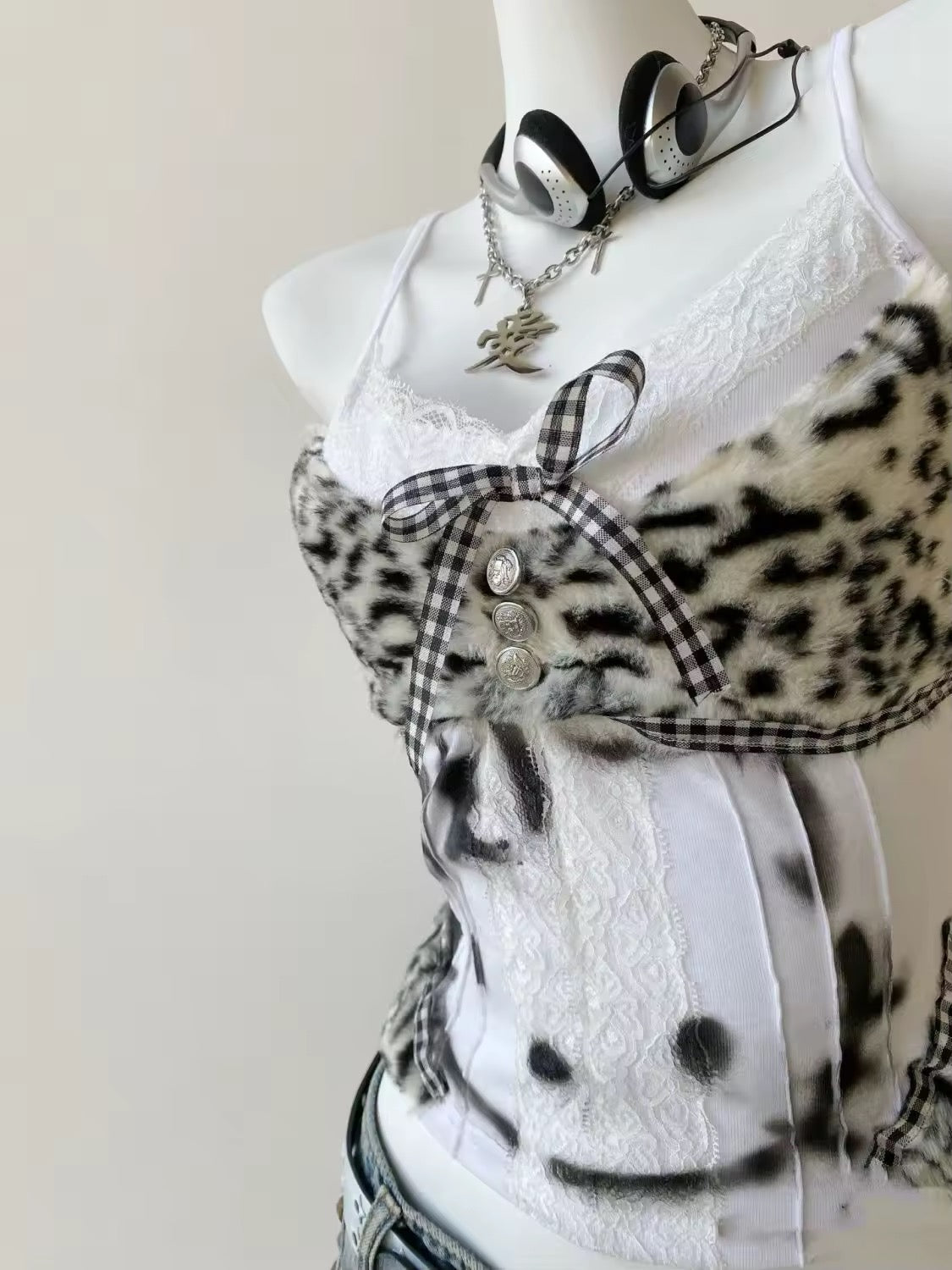 Flat lay of the Y2K corset tank top alongside accessories for a complete look