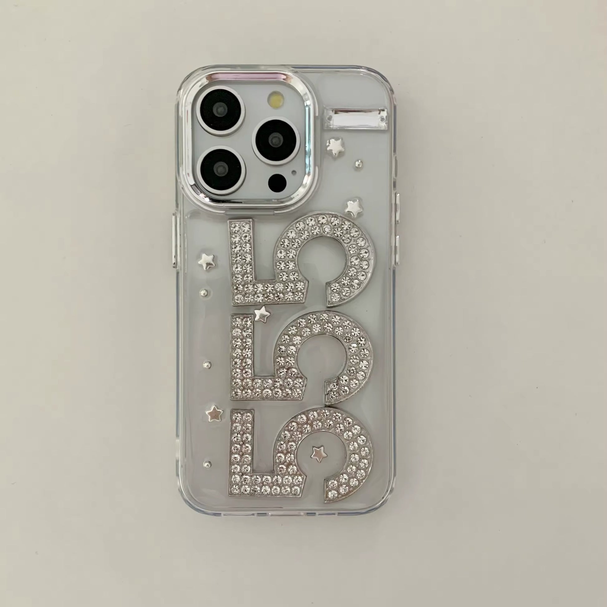 Y2K rhinestone iPhone case with glittering epoxy sequins and star details
