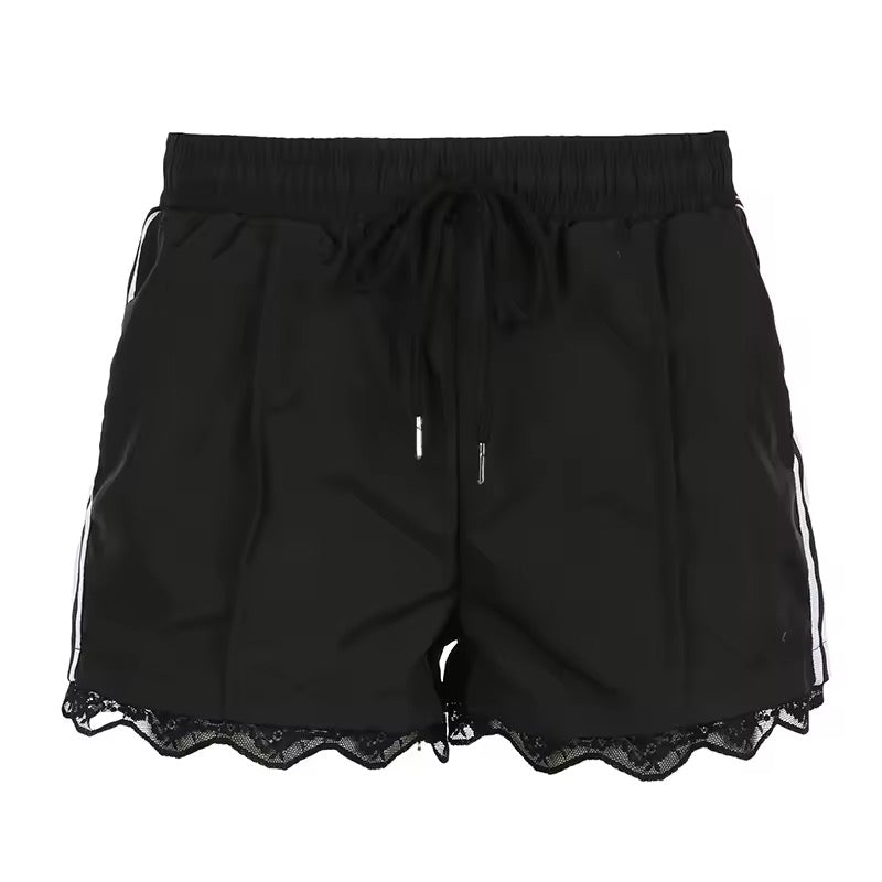 Black sporty Y2K shorts with side stripes and lace trim on the hem