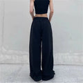 y2k black pants with white stripe design