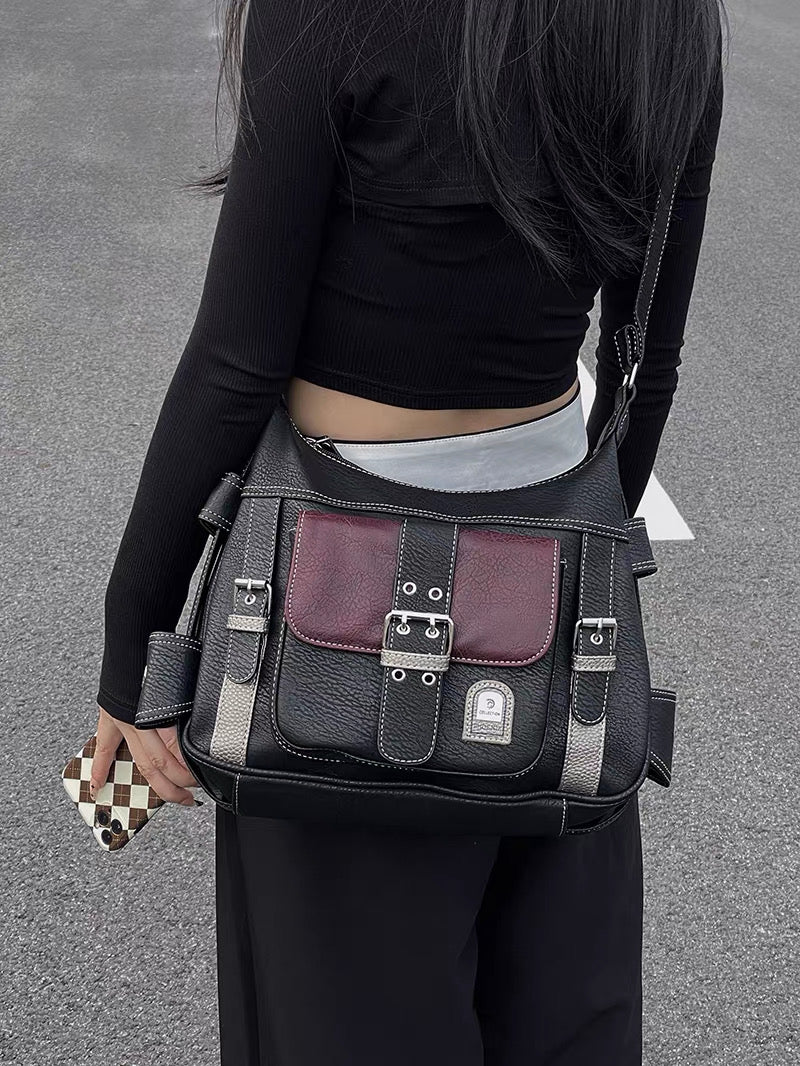 Vintage Y2K leather shoulder bag with buckles in black and red